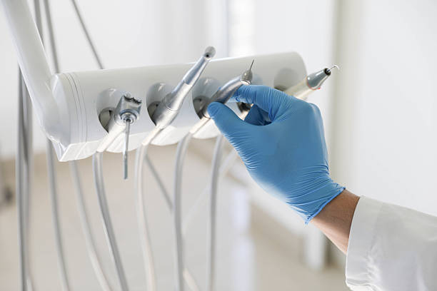 Professional Tooth Extraction technician working in Burnham, PA